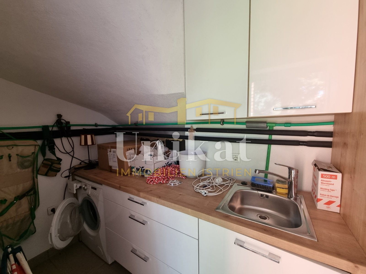 Dvojna hiša v istrskem slogu